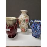 A LOVELY GERMAN WATER JUG TOGETHER WITH A RINGTONS JUG AND ONE OTHER VASE