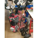 2 GOLF BAGS BOTH WITH CONTENTS AND A GOLF TROLLEY