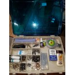 A BOX CONTAINING ASSORTED FISHING TACKLE