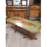 YEW WOOD COFFEE TABLE WITH LEATHER INSERT ON DOUBLE TRIPOD BASE
