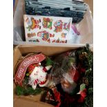 2 BOXES CONTAINING CHRISTMAS THEMED ITEMS INC WINDOW STICKERS MERRY CHRISTMAS SIGN ETC