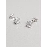 BEAUTIFUL PAIR OF DIAMOND SOLITAIRE STUDS 1CT IN TOTAL VS I/J