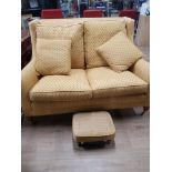 2 SEATER SHERBORNE SOFA ON BRASS CASTERS WITH MATCHING FOOTSTOOL