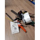 A BLACK AND DECKER HEDGE TRIMMER TOGETHER WITH A EASY CUT HEDGE TRIMMER