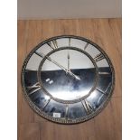 A MODERN CLOCK WITH MIRRORED FACE
