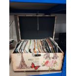 A NICE DECORATIVE BOX CONTAINING SINGLE RECORDS FROM THE 70S