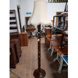 MAHOGANY STANDARD LAMP WITH FRILLED SHADE