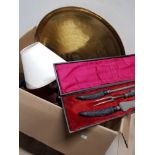 BOX CONTAINING 3 PIECE CARVING SET AND EASTERN STYLE BRASS PLAQUE PLUS BOOKS ETC