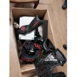 A BOX CONTAINING MOTOCROSS PROTECTIVE EQUIPMENT ETC