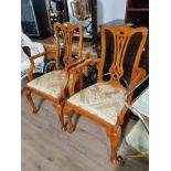 A PAIR OF CHIPPENDALE STYLE CARVER ARMCHAIRS WITH FLORAL PATTERNED UPHOLSTERED SEATS