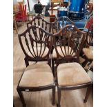 A SET OF 4 MAHOGANY SHIELD BACK DINING CHAIRS WITH SPADE FEET