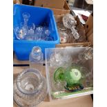 A LARGE AMOUNT OF ASSORTED GLASS INC DECANTERS WITH STOPPERS ETC