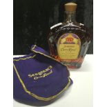 BOTTLE OF SEAGRAMS CROWN ROYAL WHISKY AND POUCH