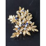 18CT YELLOW GOLD FLORAL ARRANGEMENT BROOCH WITH DIAMONDS AND SAPPHIRES 13g