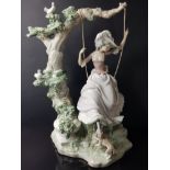 LLADRO FIGURE 9163 SWINGING DESIGNED BY SALVADOR DEBON