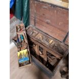 A VERY LARGE WOODEN TOOL CHEST CONTAINING A SUBSTANTIAL AMOUNT OF TOOLS INC CHISELS ETC