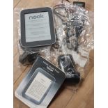 A NOOK BOOK COMES WITH CHARGER AND INSTRUCTIONS