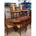 OVAL MAHOGANY G PLAN DINING TABLE TOGETHER WITH A SET OF 6 UPHOLSTERED CHAIRS