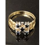 LADIES 9CT YELLOW GOLD RING SET WITH FIVE ROUND CUT SAPPHIRES SIZE N