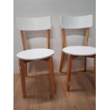 A PAIR OF MODERN BEECH FRAMED CHAIRS