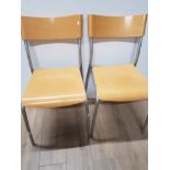 A PAIR OF METAL FRAMED CHAIRS