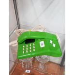 A GREEN RETRO TELEPHONE