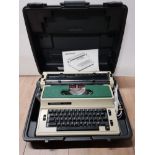 VINTAGE ELECTRIC SILVER REED TYPE WRITER IN ORIGINAL CASE