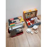 BOXED VINTAGE VULCAN CHILDS SEWING MACHINE AND BOXED MINATURE TEA PARTY SET