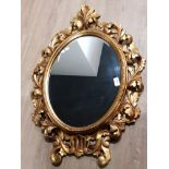 OVAL SHAPED DECORATIVE GILT FRAMED MIRROR