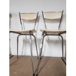 A PAIR OF CHROME BASED RETRO DESIGN CHAIRS
