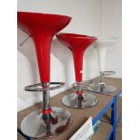 PAIR OF RED ADJUSTABLE STOOLS PLUS 1 CREAM STOOL