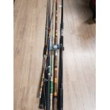 A BUNDLE OF ASSORTED FISHING RODS