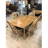 AMAZING LIGHT ERCOL EXTENDING DINING TABLE AND 6 MATCHING SPINDLE BACK CHAIRS