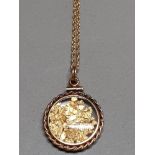 STAMPED 12KT PENDANT ON CHAIN CONTAINING GOLD LEAF 4.5G