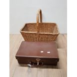 BROWN LEATHER EVACUATION CASE TOGETHER WITH WICKER BASKET