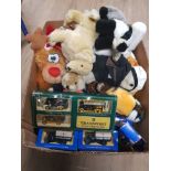 A BOX CONTAINING BOXED DIE CAST VEHICLES AND SOFT TOYS