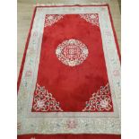 LARGE RED FRINGED CHINESE RUG 269 X 175CM