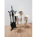 A WROUGHT IRON FIRE COMPANION SET TOGETHER WITH 3 CANDLE HOLDERS
