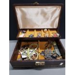 A JEWELLERY CHEST CONTAINING ASSORTED COSTUME JEWELLERY INC CAMEO ETC