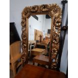 LARGE GILT AND ORNATE FRAMED FRENCH STYLE MIRROR