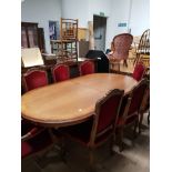 HEAVILY CARVED DOUBLE PEDESTAL OVAL DINING TABLE AND A SET OF 6 MATCHING CHAIRS