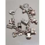 SILVER CHARM BRACELET WITH 14 CHARMS 72.5G