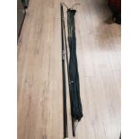 A BEACH CASTER FISHING ROD IN CARRY BAG