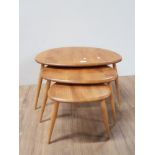 A NEST OF 3 BLONDE ERCOL PEBBLE STONE TABLES