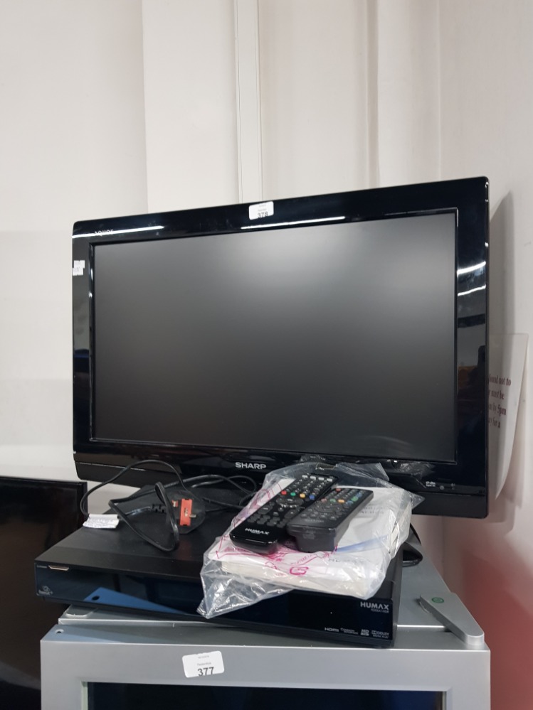 26INCH SHARP TV WITH REMOTE AND FREESAT BOX ALSO WITH REMOTE