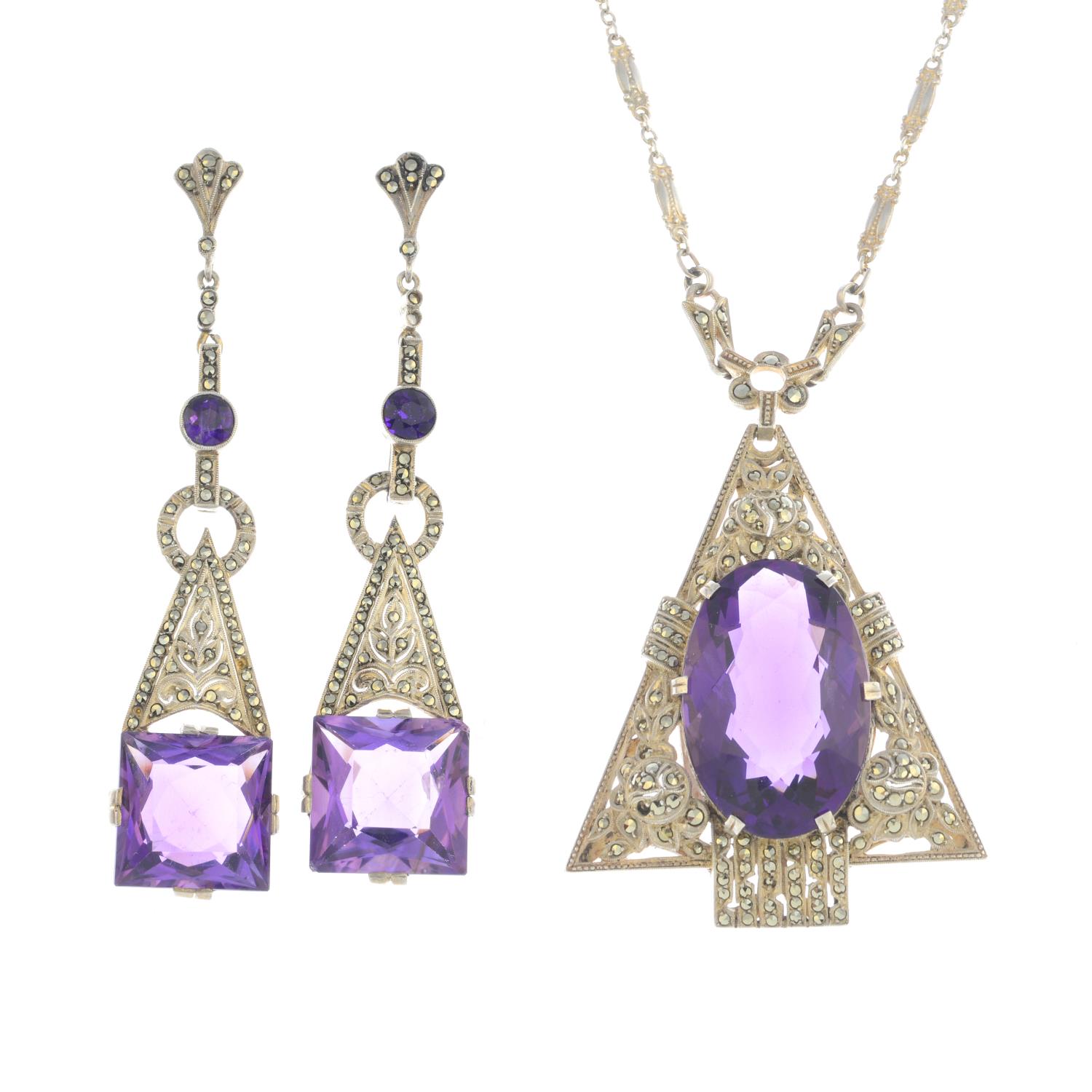 THEODOR FAHRNER - an early 20th century silver amethyst and marcasite pendant and earrings.