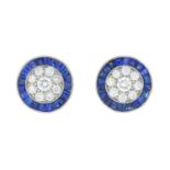 A pair of diamond and sapphire earrings.