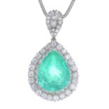 A Colombian emerald and diamond pendant.