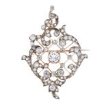 A late 19th century silver and gold diamond pendant.