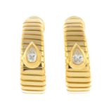 BULGARI - a pair of 18ct gold diamond 'Tubogas' earrings.